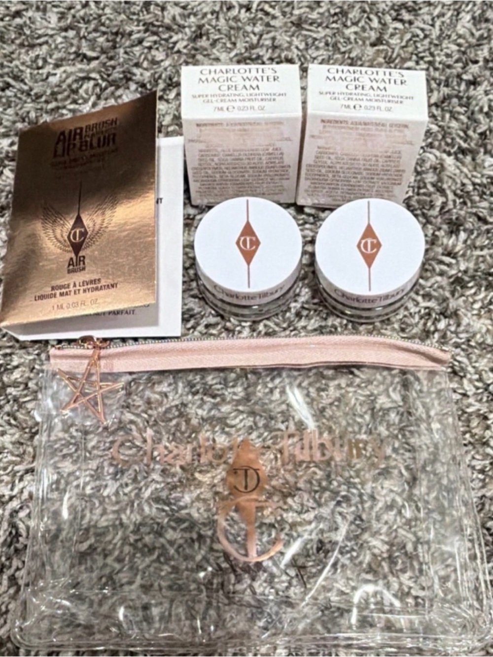 Charlotte Tilbury White and Pink Travel Skincare Set with Clear Pouch